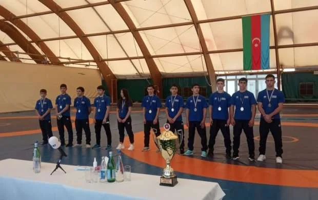 Çempion güləşçilərimiz mükafatlandırıldı 