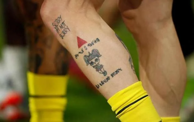 Çinli futbolçulara tatuaj qadağan edildi 
