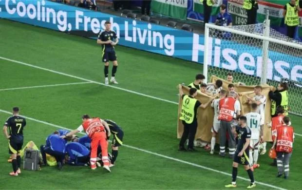 Ölümdən dönən macar futbolçunun son durumu: Üz sümükləri qırılıb - VİDEO 